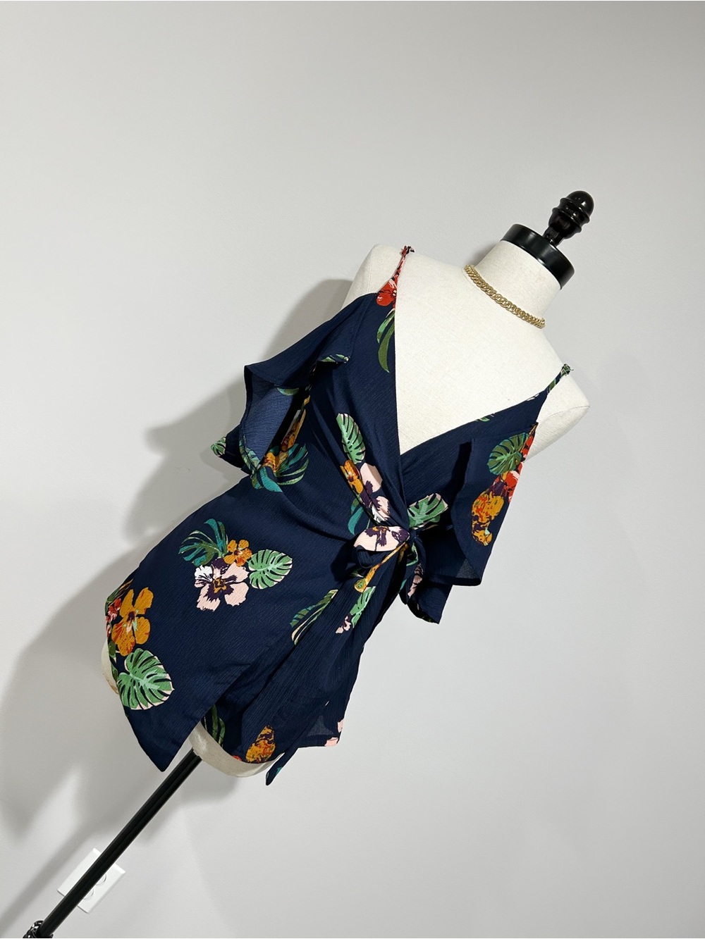 Fashion Nova Navy Floral Wrap Romper